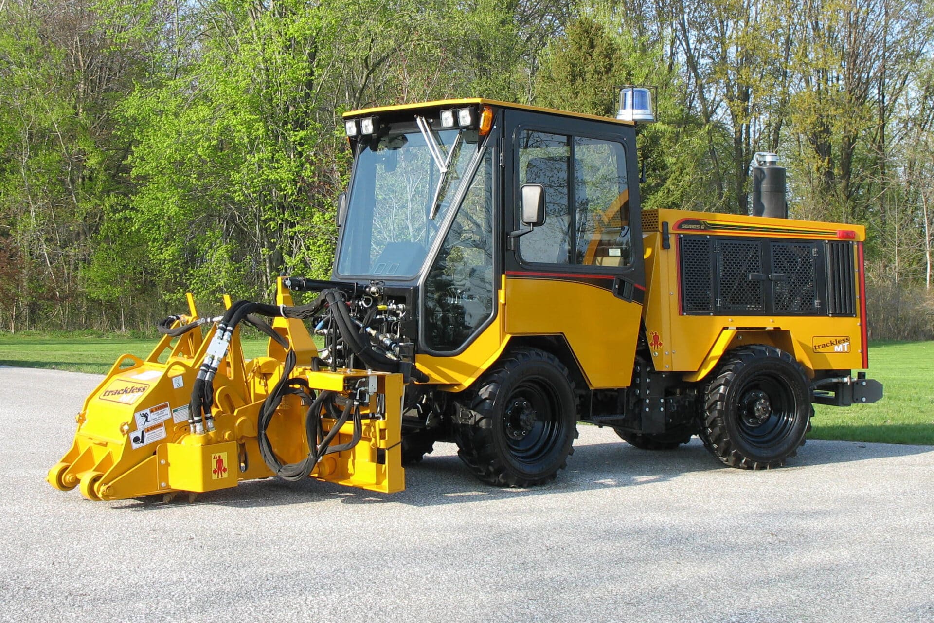 trackless vehicles mt6 tractor machine and cold planer attachment